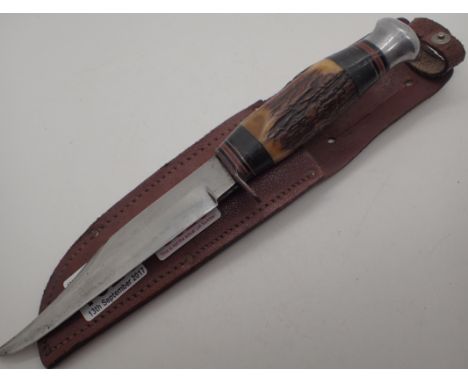 Antler handled sheath knife    CONDITION REPORT:  POSTAGE: There are International restrictions on the shipment of this item.