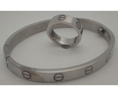 Cartier style bangle and ring set   CONDITION REPORT:  This item is not an original.