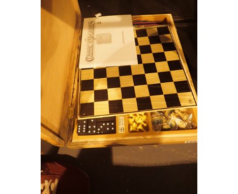 Wood cased compendiumm of 10 classic games, draughts, checkers, chess etc 