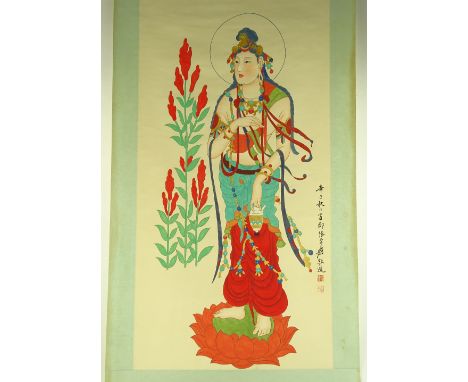 A Chinese watercolour scroll painting depicting a Hindu Goddess, text inscription and seal, main panel 128cm x 65cm.