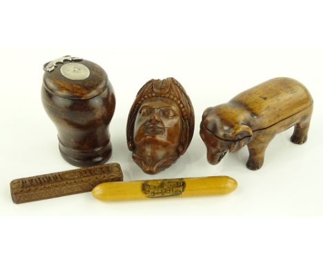 A group of treen items, including an elephant design vesta box, length 9cm, a snuff mull with unmarked silver mounts, a fruit