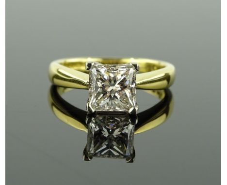 An impressive 1.75ct princess-cut solitaire diamond ring, 18ct yellow and white gold settings, setting height 7mm, size K.