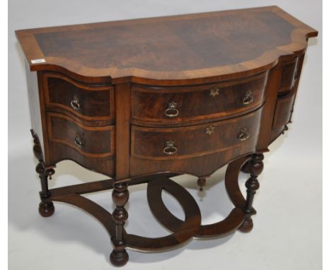 An ornate burr walnut side table of small size, 6 shaped frieze drawers with turned supports and shaped stretchers, width 3'2