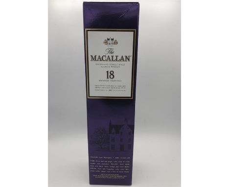A bottle of 18 year old Macallan single malt Scotch Whisky.