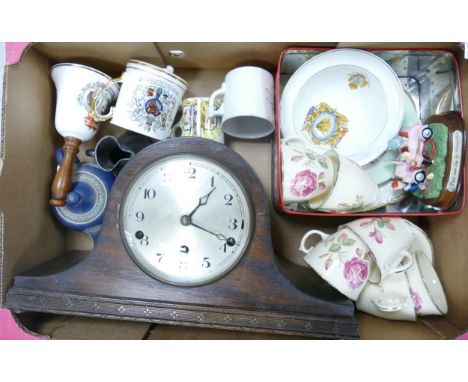 A mixed collection of items to include Oak mantle clock , commemorative mugs, floral tea ware etc 