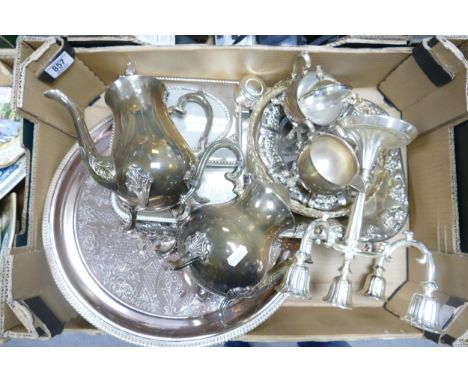 A collection of silver plated items to include tea service, picture frame, serving trays, candelabra etc