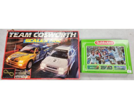 Boxed Scalextric Team Cosworth part set together with Subbuteo 372/9924 boxed game set