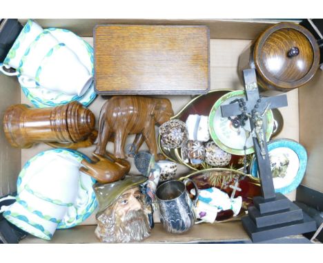 A mixed collection of items to include Carltonware, hand decorated teaware, wooden elephants, silver plated christening mug e