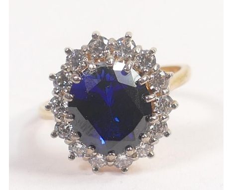 Tru Diamonds large synthetic sapphire &amp; white stone cluster ring, size R, with unknown gilt metal setting.  High quality 