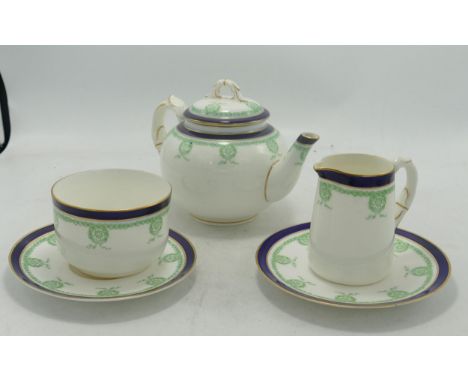 Royal Worcester pattern 7725 teapot and stand together with sugar bowl, saucer and milk jug 