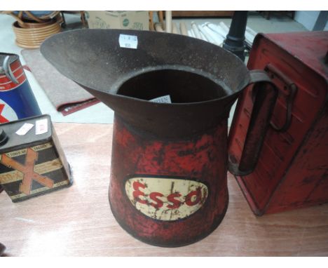 A vintage 1960s commercial Esso gallon Oil jug.