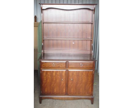 Stag Minstrel dresser, twin shelf back above two drawers and to doors, on bracket feet, W98cm D46cm H172cm 