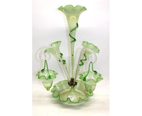Victorian opaline uranium glass epergne, the bowl with wavy rim, three trumpet shaped vases with applied spiral decoration an