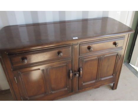 Ercol dresser, two drawers above two doors, with blue label, W121cm D48cm H86cm 
