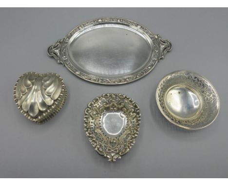 Early 20th century silver oval tray with floral repousse border, hallmarks rubbed, Victorian silver heart shaped trinket box 