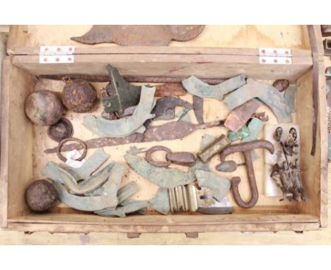 Collection of metalware items in relic state, including axe heads, spears, weights, canon balls etc. 