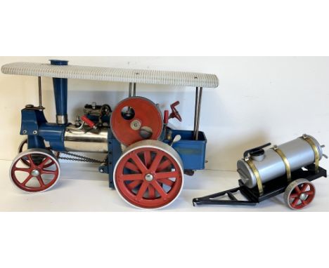 Wilesco live steam traction engine 'Old Smokey' in blue and red livery, L31cm, with Wilesco water trailer, L21cm (2) 