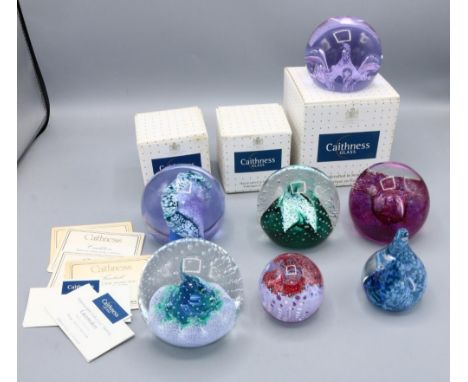 Collection of Caithness glass paperweights, incl. Moonflower, Cauldron, Wavecrest, and others (7) 