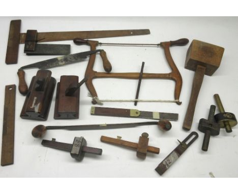 19th century ebony and brass marking gauge; other marking gauges; two spoke shaves; carpenter's squares and other carpenter's