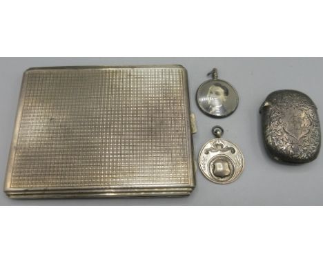 Hallmarked Sterling silver cigarette case, with gilt interior and engine turned detail, by K W, Birmingham, 1941, a hallmarke