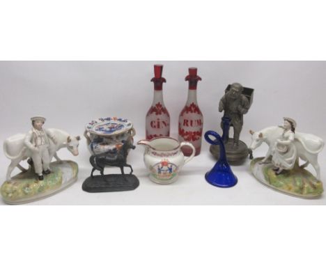 Japanese white metal figure modelled as a farmer with a basket on his back, on a circular plinth, H27cm; Bristol blue glass f