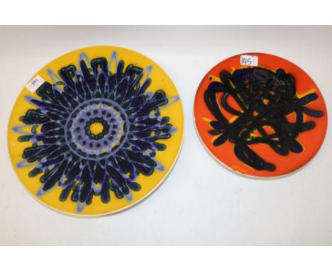 Two Poole Pottery Delphis range chargers, D36cm and D27cm 