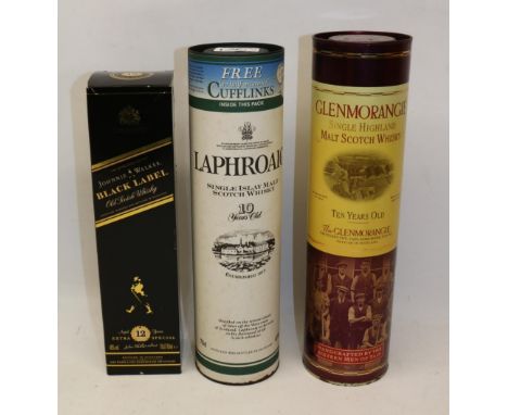 Laphroaig 10 years old single malt Scotch Whisky in gift tube; Johnnie Walker Black Label Old Scotch Whisky; and Glenmorangie
