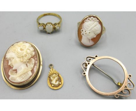 9ct yellow gold three stone opal ring, stamped 375, a 9ct brooch coin mount, stamped 9ct, a 14ct gold mounted cameo brooch, s