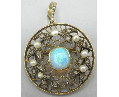Unmarked yellow metal circular drop pendant, set with central opal, surrounded by wreath design set with seed pearls and diam