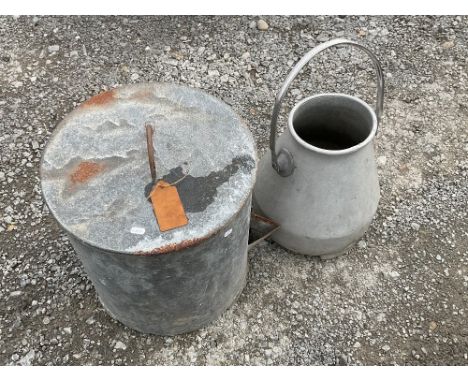A circa 1950s poultry feeder and a vintage Gascoigne milk churn 