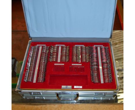 POLICE > Opticians case full of test lenses [VAT ON HAMMER PRICE] [NO RESERVE]