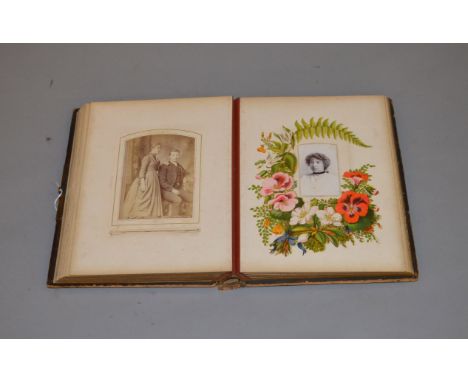 A Victorian photograph album containing various portrait photographs.