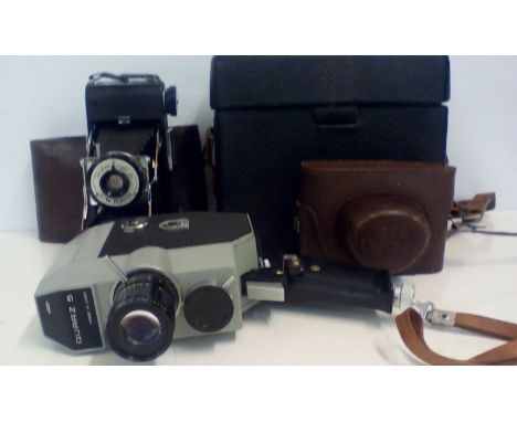 Two Vinatge Cameras Together With A Cine Projector 