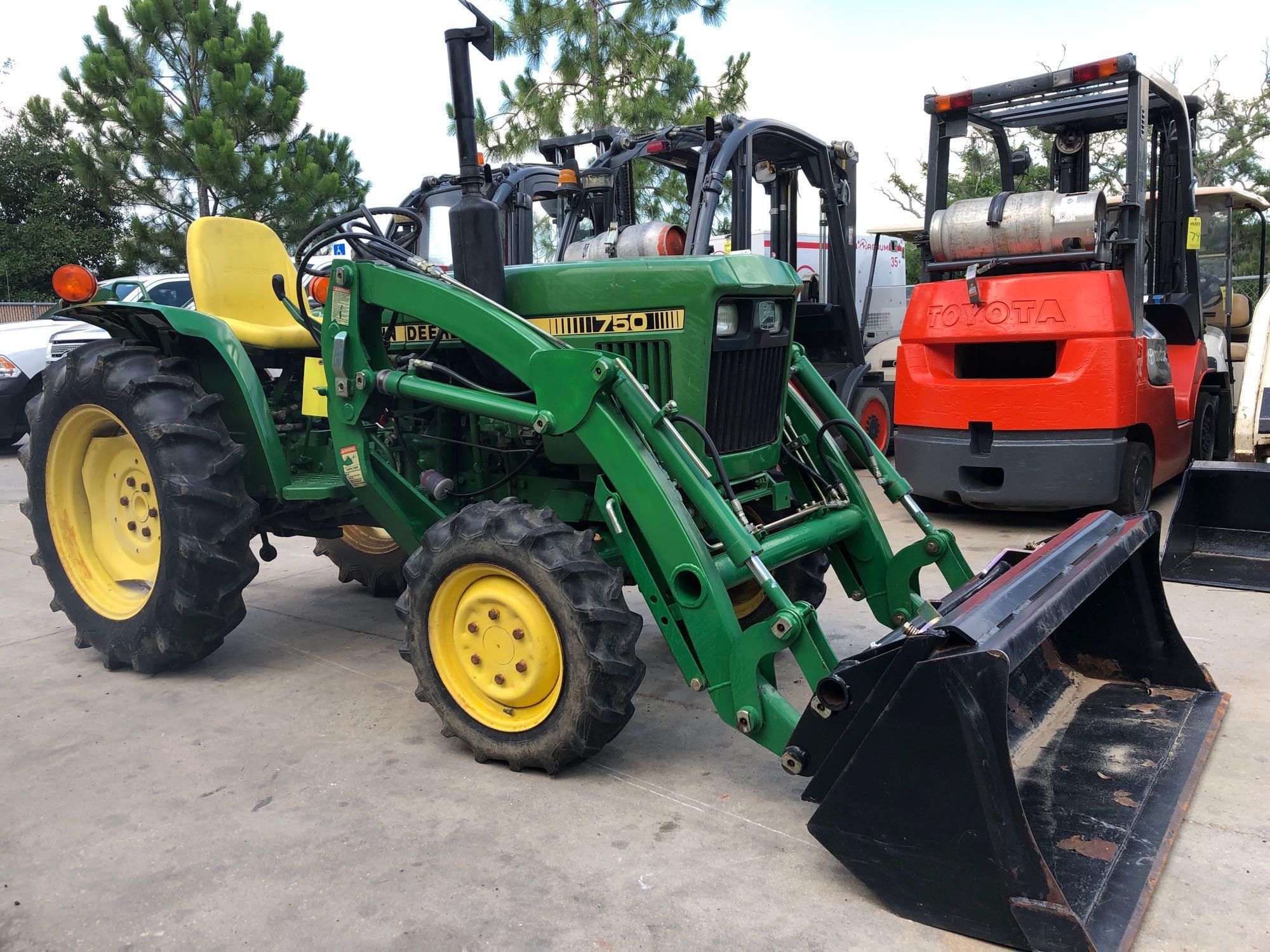JOHN DEERE 750 TRACTOR WITH BUCKET ATTACHMENT, 1,042 HOURS SHOWING