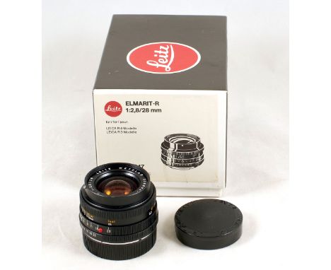 Leitz (Germany) 28mm f2.8 Elmarit-R Lens. #3368047 (condition 5F) with caps and in maker's box.