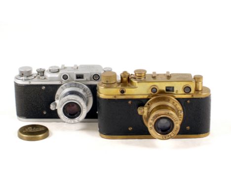 Russian Fake 'Luxus' &amp; 'Wehrmacht' Leica Cameras. A plated Zorki 2C camera trying (and failing) to look like a Leica Luxu