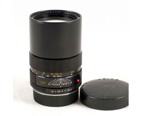 Leitz (Canada) 135mm f2.8 Elmarit-R Lens. #3136211 (condition 4/5F) with original caps.