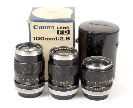 Three Early Canon FD Portrait lenses. Comprising 100mm f2.8 #27072 with case in maker's box and two FD 135mm f3.5 lenses #647