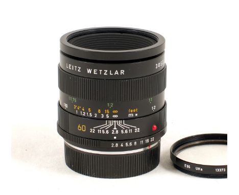 Leitz (Germany) 60mm f2.8 Macro Elmarit-R Lens. #3050328 (condition 4/5F) with original rear and replacement front caps.