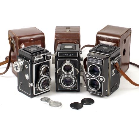 Zeiss Ikon &amp; Rolleiflex TLRs. Comprising Rollei Magic with Xenar 75mm f3.5 #2506879 with cap and case, Ikoflex with Tessa