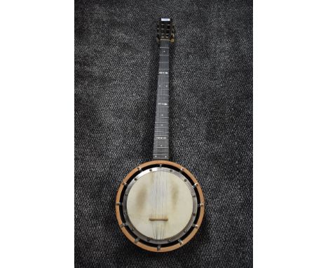 An early 20th Century 5 string Banjo, impressed mark W E TEMLETT, LONDON, Apollo Model number three, fretboard length 18in ap