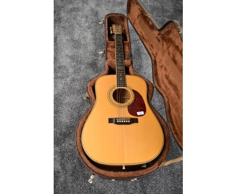 A Tanglewood acoustic guitar, in plush lined hard case, serial number 98034976