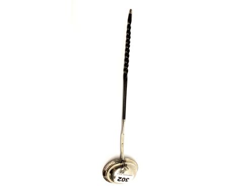 A Georgian silver toddy ladle (partial mark) with baleen handle, L. 34cm.