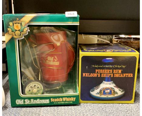 An Old St Andrews presentation Scotch whiskey in leather golf bag with a Pusser's rum, Nelson's Ship decanter (unopened).