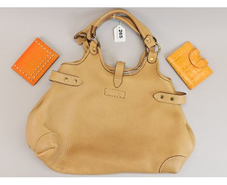 A vintage J&amp;M Davidson camel leather tote bag, W. 47cm, together with a J&amp;M Davidson studded leather purse and a furt