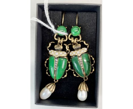 A pair of Alexander McQueen style costume jewellery earrings and matching brooch, in the form of green Egyptian scarab beetle