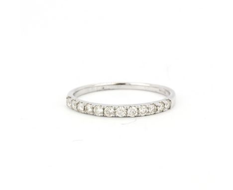 A 9ct white gold half eternity ring set with brilliant cut diamonds, approx. 0.33ct total, (Q.5).