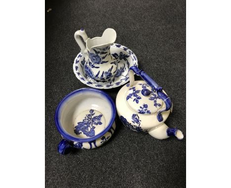 An Ironstone blue and white kettle, together with an Ironstone blue and white chamber pot and a blue and white toilet jug and
