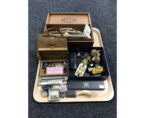 A tray containing a cigar box containing black and white photographs, a national registration identity card, together with a 