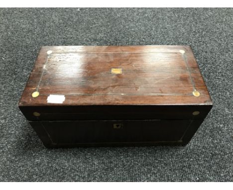 A Victorian rosewood tea caddy